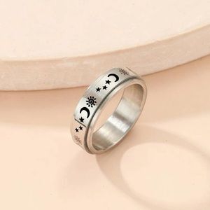 Silver moon and star spin ring